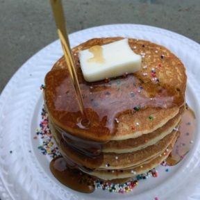 Gluten-free Funfetti Pancakes with butter and syrup